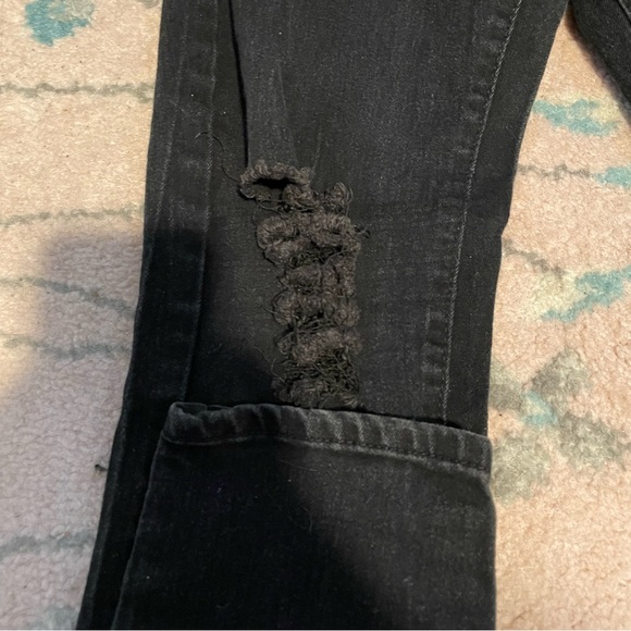 Black distressed jeans with rips on the knees and a button fly - Picture 2 of 6